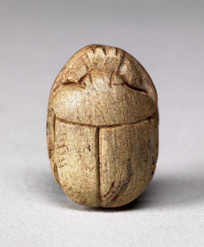 Scarab amulet with hieroglyphs