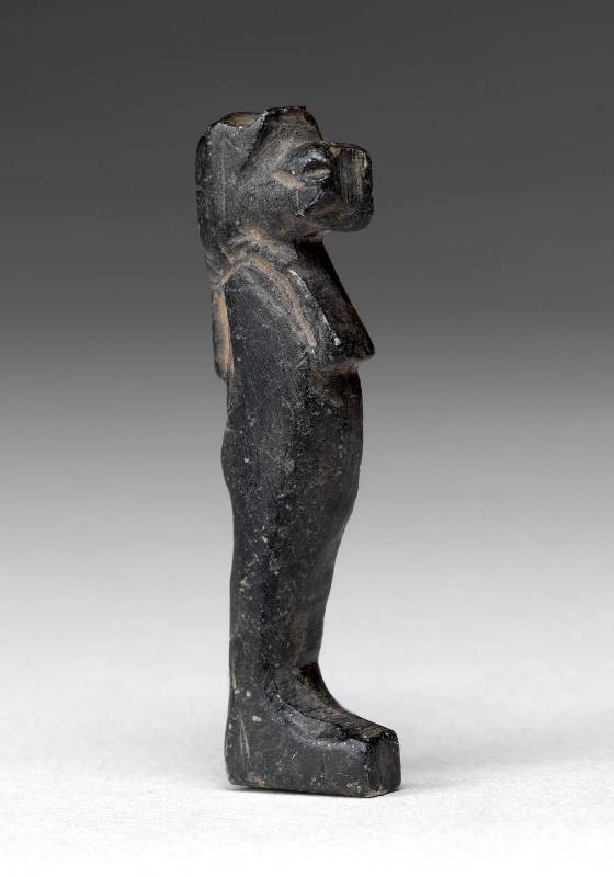Figure amulet with animal head