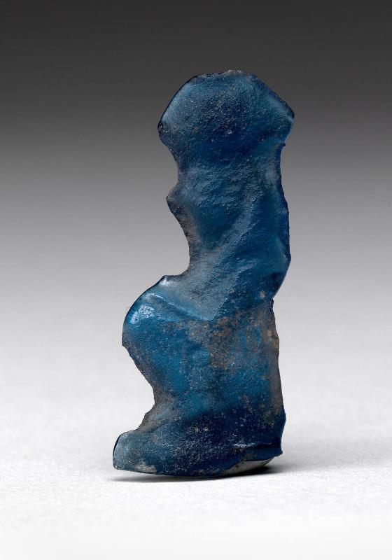 Amulet (?) of a seated figure