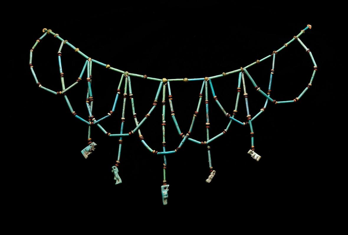 Necklace with beads and amulets