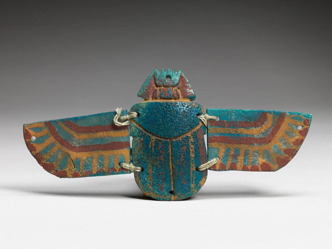 Winged scarab