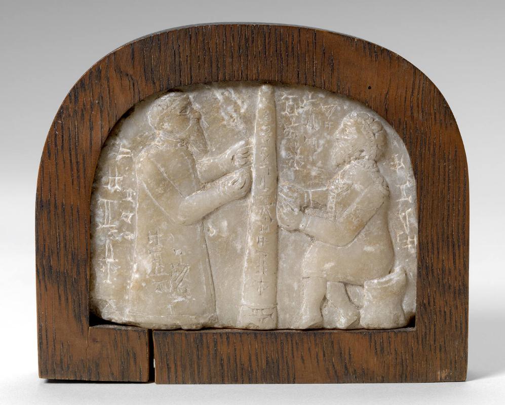 Relief with two bearded figures