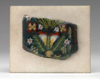 Fragment of glass inlay