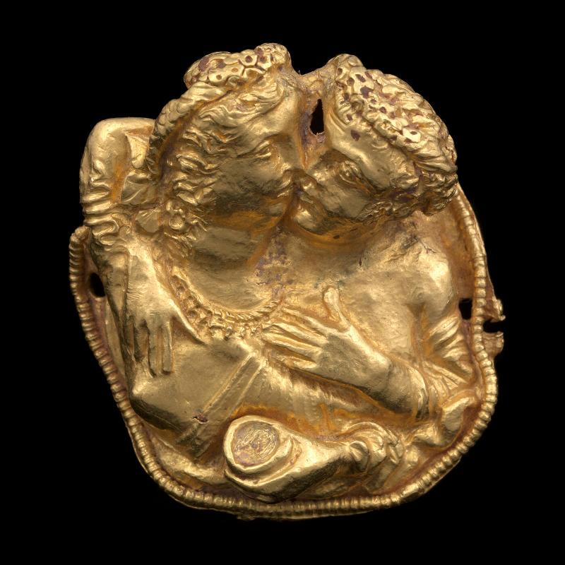 Medallion phalera (or military insignia) with banqueting lovers
