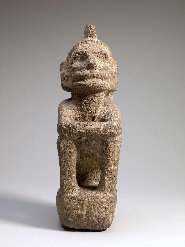Seated deity with crested headdress