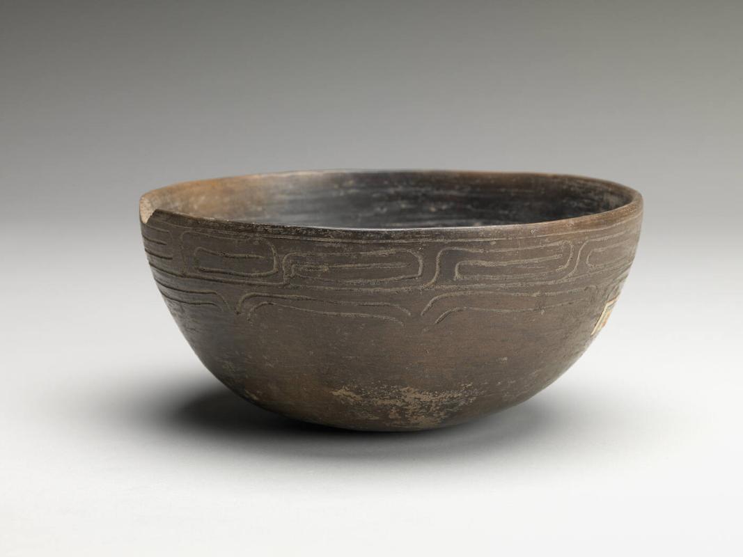 Bowl with incised rim