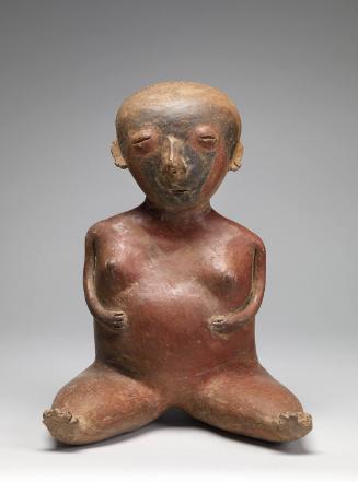 Seated pregnant woman