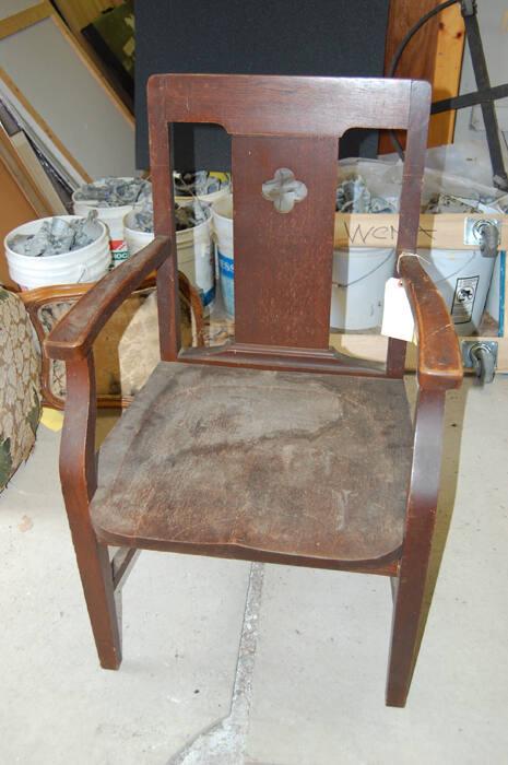 Arm chair with quatrefoil design