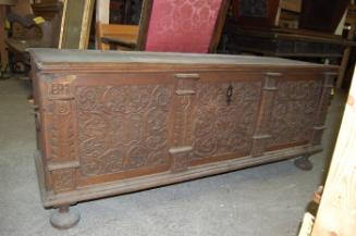 Long chest with carved front