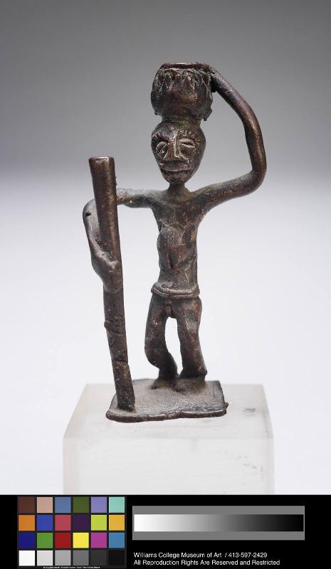 Gold weight in form of a standing man with stick