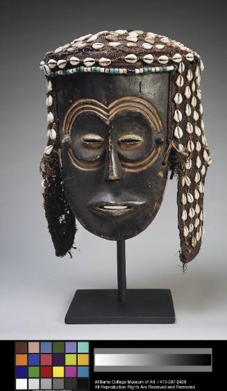 Mask with beaded headdress