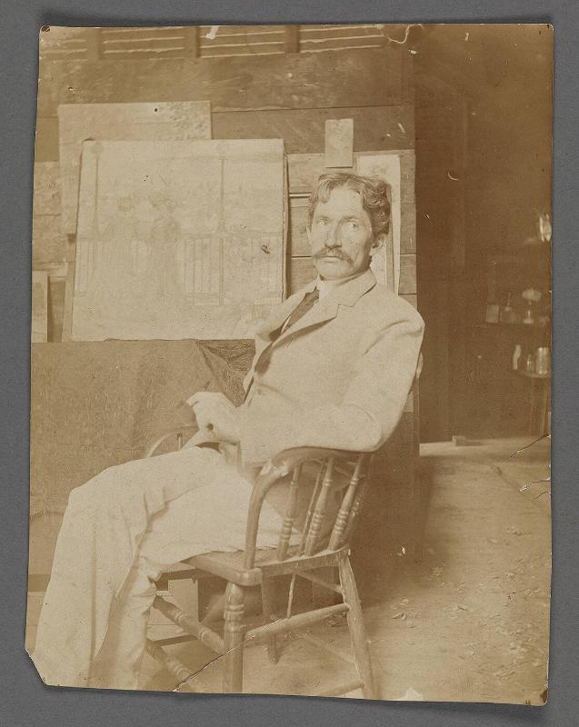 Charles Prendergast  seated in his studio
