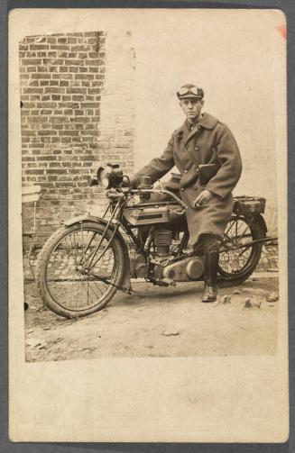 Series of Charles and Ethel Gatenby in England; Charles on motorcycle