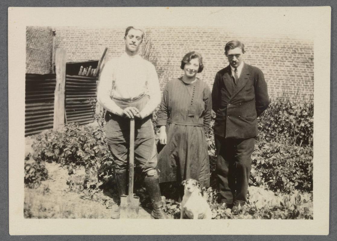 1927-1929 series of Eugénie and Charles Prendergast and Vankemmel family members in France; group standing in garden