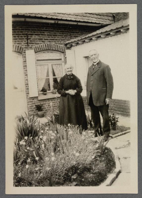 1927-1929 series of Eugénie and Charles Prendergast and Vankemmel family members in France; couple standing in garden