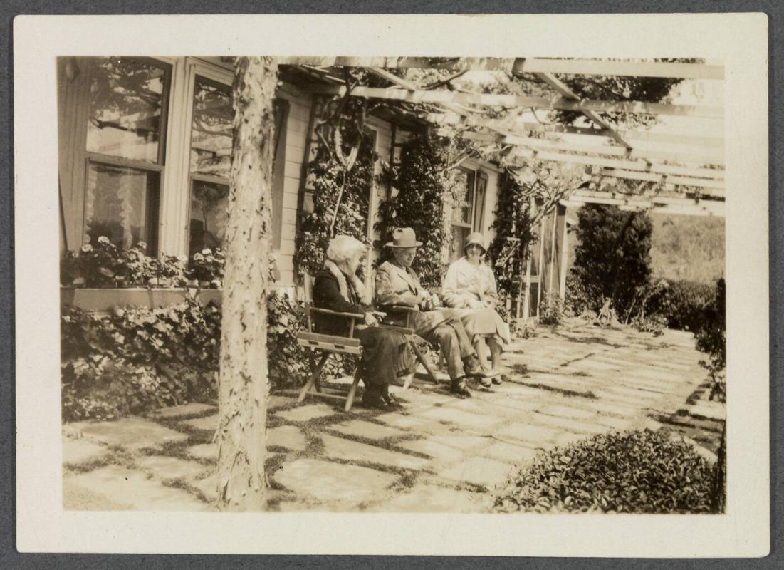 1927-1929 series of Eugénie and Charles Prendergast and Vankemmel family members in France; Eugénie and Charles Prendergast, and woman seated in front of house