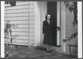 Series including Antoinette Maynard, Charles Prendergast, Eugénie Prendergast, Elizabeth Crawford and Marion Travis; Antoinette Maynard standing outside house