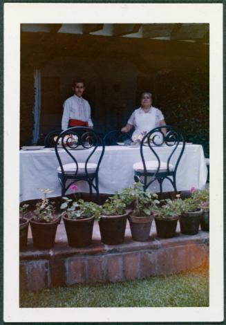 Cuernavaca, Mexico home of Robert Brady: table scene with servants