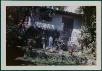 Cuernavaca, Mexico home of Robert Brady; Robert Brady in front of house