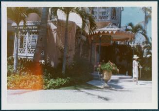 Series in Palm Beach Florida; woman outside hotel