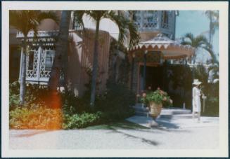 Series in Palm Beach Florida; woman outside hotel