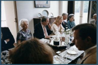 Eugénie Prendergast's 90th birthday party; Eugénie Prendergast seated at table with friends
