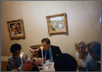 Series of a dinner at Williams College Museum of Art including Eugénie Prendergast and others; group of guests at table