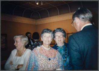 Series of a dinner at Williams College Museum of Art including Eugénie Prendergast and others; (L to R) Cathy Genvert, unknown woman, Eugénie Prendergast