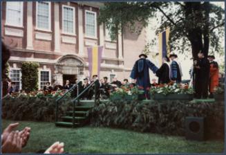 Eugénie Prendergast receiving her honorary degree at 1985 Williams College Commencement ceremony including friends and college officials; Eugénie Prendergast walking with college officials to be seated