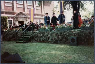 Eugénie Prendergast receiving her honorary degree at 1985 Williams College Commencement ceremony including friends and college officials; Eugénie Prendergast being walked to receive her honorary degree
