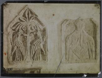 Carving of birds, tree on left, and religious figure 3/4 length on right