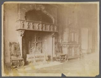 Musée de Cluny. Fireplace with carved figures on mantle.