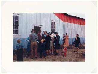 Group of homesteaders in front of the bean house which was used for an exhibit hall at the Pie Town, New Mexico Fair