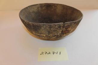 Ritual bowl with carved design and original repairs