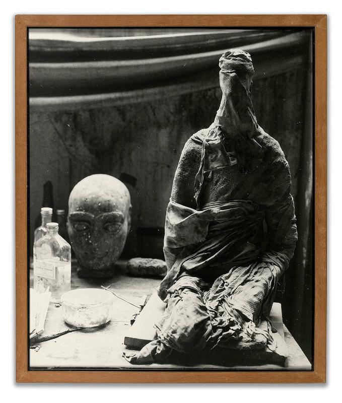 Alberto Giacometti's studio in Paris [interior with seated figure and head]