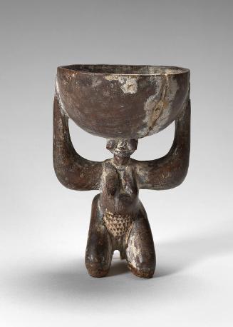 Ritual cup with female figure