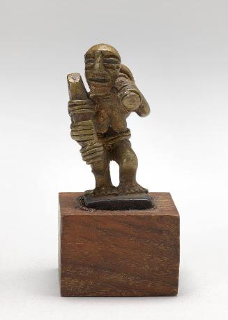 Gold weight in the form of a figure of a gold miner