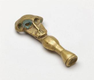 Gold weight in the form of a ceremonial sword with baboon skull sheath