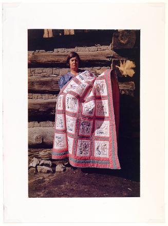 Mrs. Bill Stagg with state quilt which she made, Pie Town, New Mexico.