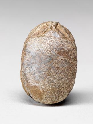 Scarab amulet with hieroglyphs
