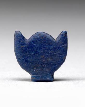Amulet of Solar disc between horns