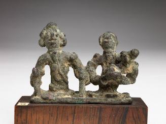 Group of two seated figures