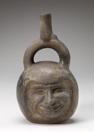 Stirrup-spout vessel