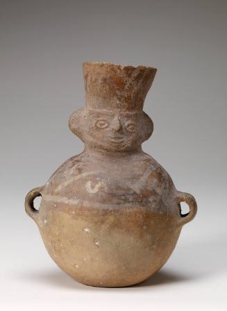 Water bottle in form of human effigy with headdress