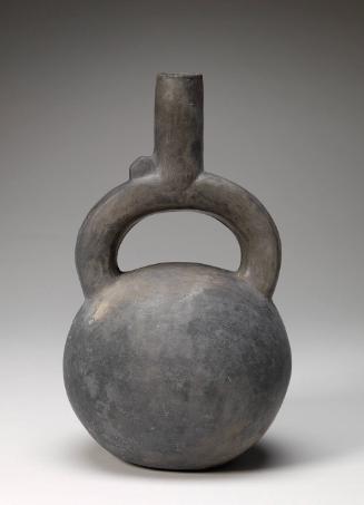 Stirrup-spout vessel