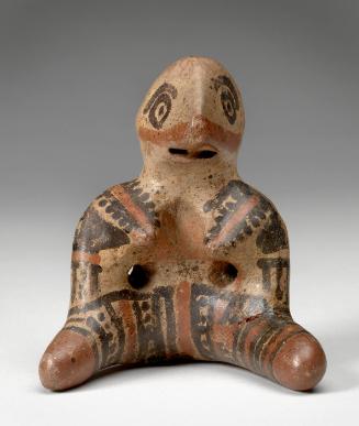 Triangular-faced female figurine