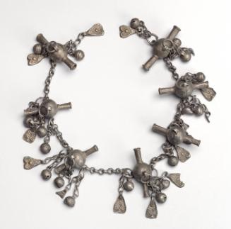 Necklace with bells and charms