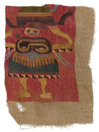 Tapestry fragment with grotesque figure