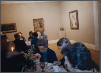 Series of a dinner at Williams College Museum of Art including Eugénie Prendergast and others; Eugénie Prendergast at table