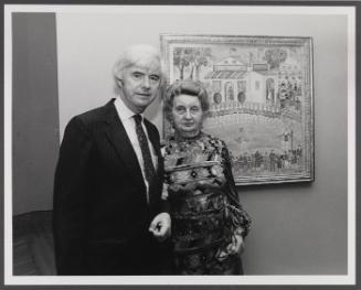 Eugénie Prendergast and Frank Oakley at Williams College Museum of Art in front of Charles Prendergast panel,"Skaters at the World's Fair"